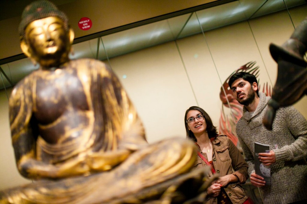 Golden Buddha with Visitors