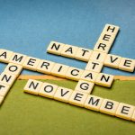 November - National Native American Heritage Month, crossword on abstract paper landscape, reminder of historical and cultural event